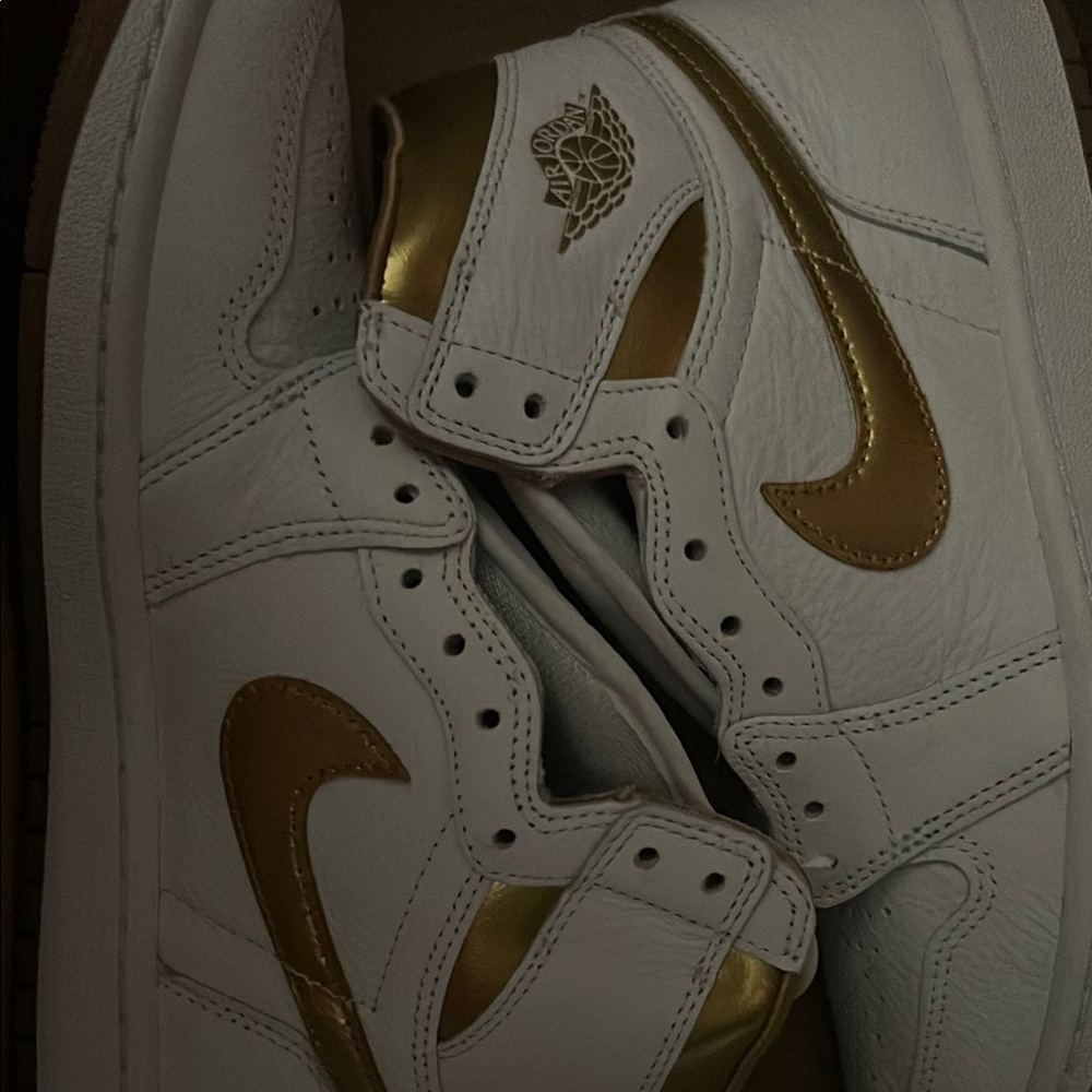 Nike White and Gold Sneakers with Classic High-Top Design